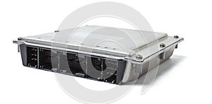 Metallic car engine control unit with plastic elements on a white isolated background is connecting center of various subsystems,