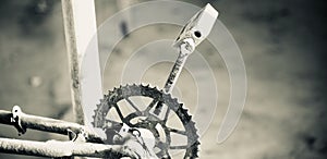 Metallic chain cranks of a bicycle photo