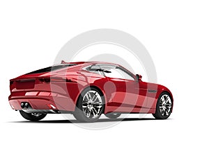 Metallic cherry red luxury sports car - back view