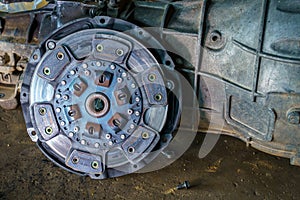 Metallic clutch expire on background gear transmission.