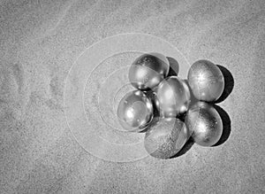 Metallic Easter Eggs in the sand