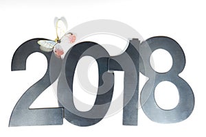 Metallic figures 2018 and paper butterfly on a white background, New Year background