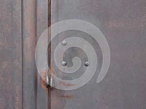 Metallic garage door gate with red infernal color and copy space