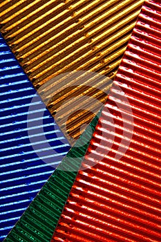 Metallic glitter vintage lights background. blue, red and gold