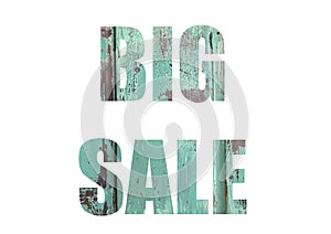 metallic green texture. Shot through the cut-out silhouette of the word BIG SALE