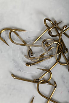 Metallic isolated macro hook steel fishhook pile