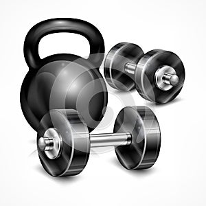 Metallic kettle bell and two dumbbells