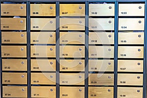 Metallic letter mailboxes at postal room in condominium building