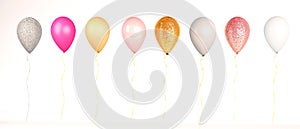 Metallic modern balloons isolated on a white background