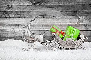 Metallic Reindeer and Sleigh with Green Gifts