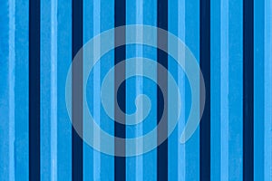 Metallic rippled surface of blue color texture, background