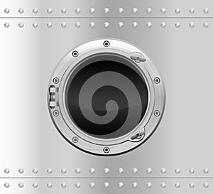 Metallic round porthole with screws.