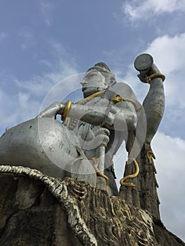 Metallic sculpture of Lord Shiva shot from a different angle.