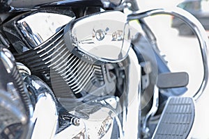 Metallic shiny motorcycle parts and motor parts.