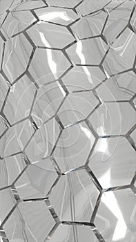 Metallic silver hexagonal geometric surface reflecting light with a modern abstract pattern