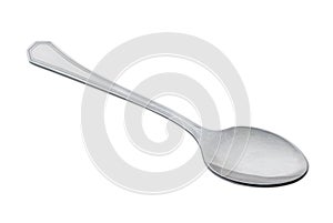Metallic spoon isolated on white photo