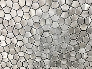 Metallic Stainless Steel Tile in a Geometric Pattern