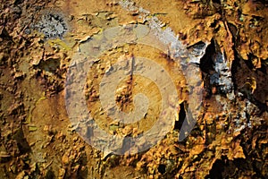 Metallic surface painted with a lot of rust