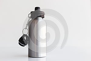 Metallic thermal cup on white background
