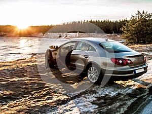 Metallic Volkswagen Passat cc at the Manniku Lake