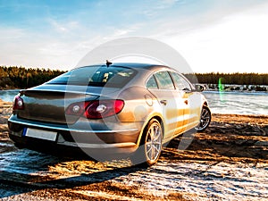 Metallic Volkswagen Passat cc at the Manniku Lake