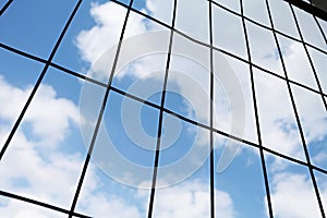 Metallic wire mesh with sky on background