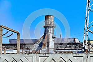 Metallurgical plant against the blue sky