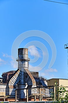 Metallurgical plant against the blue sky
