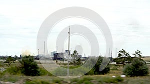Metallurgical plant in the city of Temirtau, Kazakhstan. On the horizon there are chimneys that pollute the atmosphere.