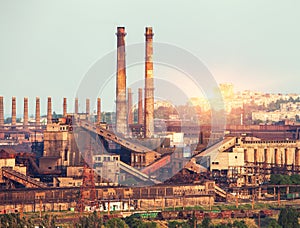 Metallurgical plant at colorful sunset. Industrial landscape. St