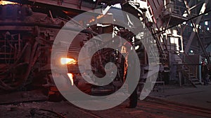 Metallurgist Job Worker In A Steel Plant Hot Molten Metal Pouring. Blast Furnace Steel Production Steel Works. Pouring