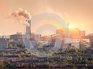 Metallurgy plant at sunset. Steel mill. Heavy industry factory