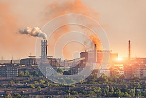 Metallurgy plant at sunset. Steel mill. Heavy industry factory