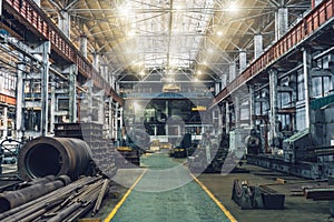 Metalwork factory with machines, lathes and steel pipes for processing metal production, industrial interior