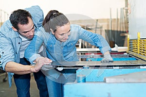 Metalwork girl training in workshop