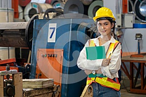 Metalwork manufacturing factory inspection with female engineer. Exemplifying