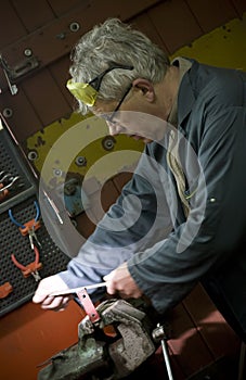 Metalworker in his workshop