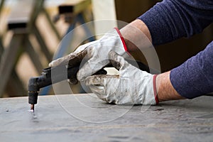 Metalworker at work photo