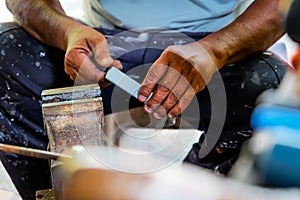 Metalworker working in workshop