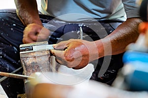 Metalworker working in workshop