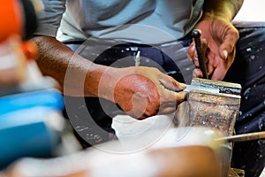 Metalworker working in workshop
