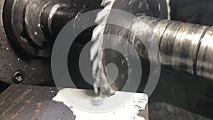 Metalworking.disk detachable mill cuts detail on universal horizontally milling machine,cutting process occurs with great vibratio