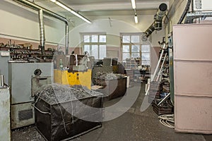 metalworking industry. finishing or grinding of a metal surface on a grinding machine at the factory. Retro metalworking