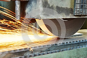Metalworking industry. finishing metal surface on horizontal grinder machine