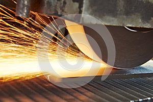 Metalworking industry. finishing metal surface on horizontal grinder machine