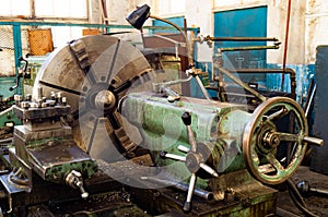 Metalworking workshop, metal processing machines. Levers of control of the machine. photo