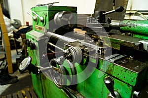 Metalworking workshop, metal processing machines. Levers of control of the machine. photo