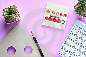 Metaverse loading on sticky notes on modern desk