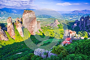 Meteora, Greece. Incredible sunrise view of sandstone rock formations and monasteries