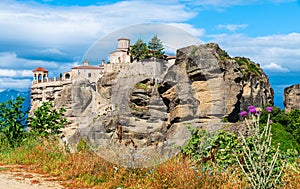 Meteora landscape with Varlaam monasteries and face sculpture